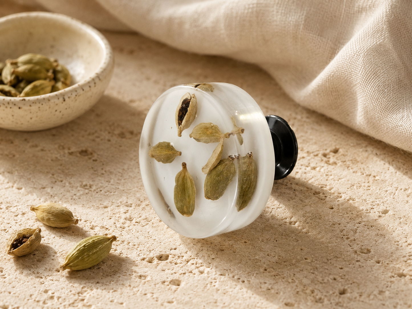 Handmade cardamom resin cabinet knob with real green cardamom pods and dark metal base
